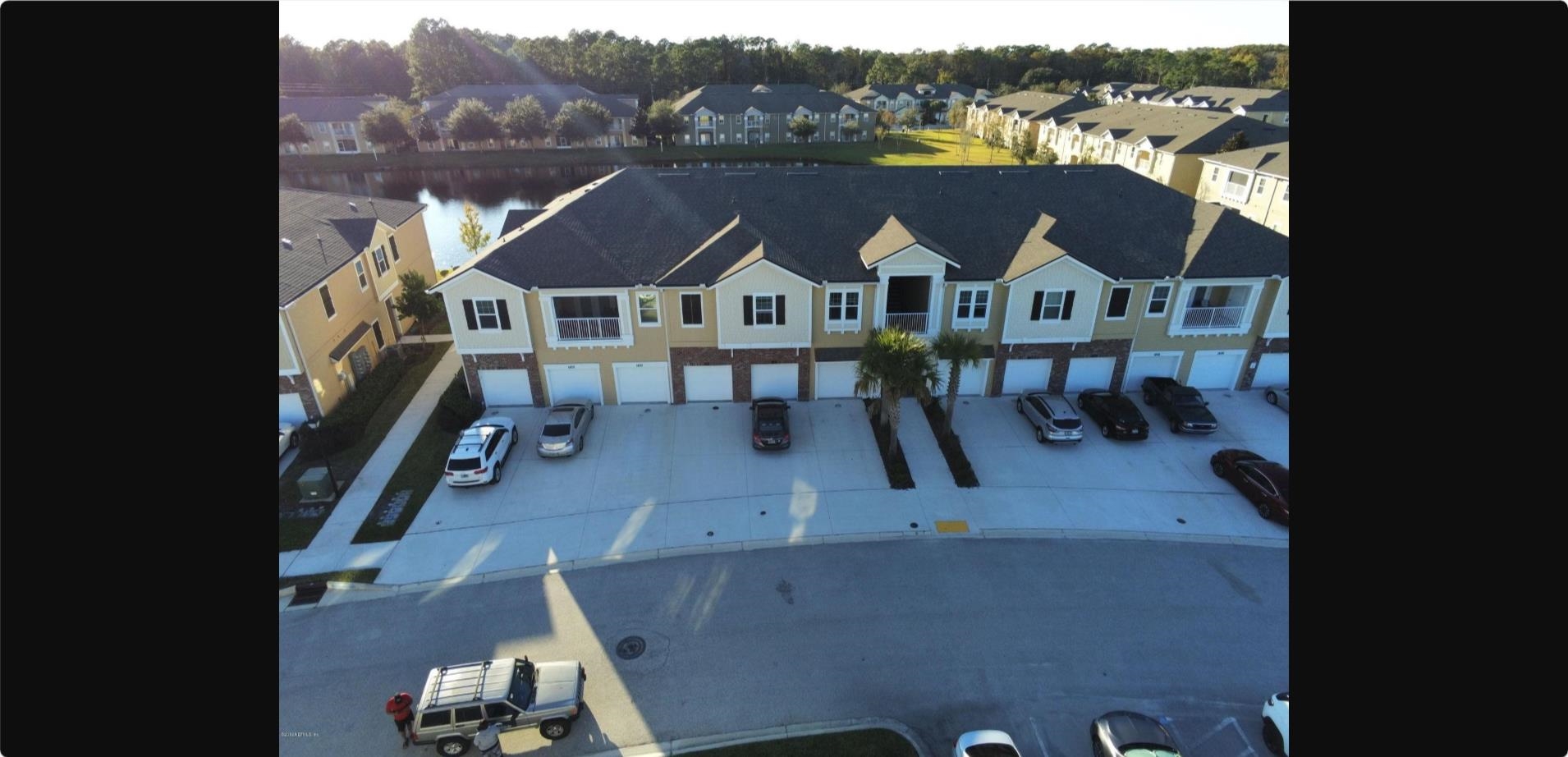 1513 Golden Lake Loop St. Augustine, FL 32084 - Photo 2 of 17 an aerial view of a house with a big yard