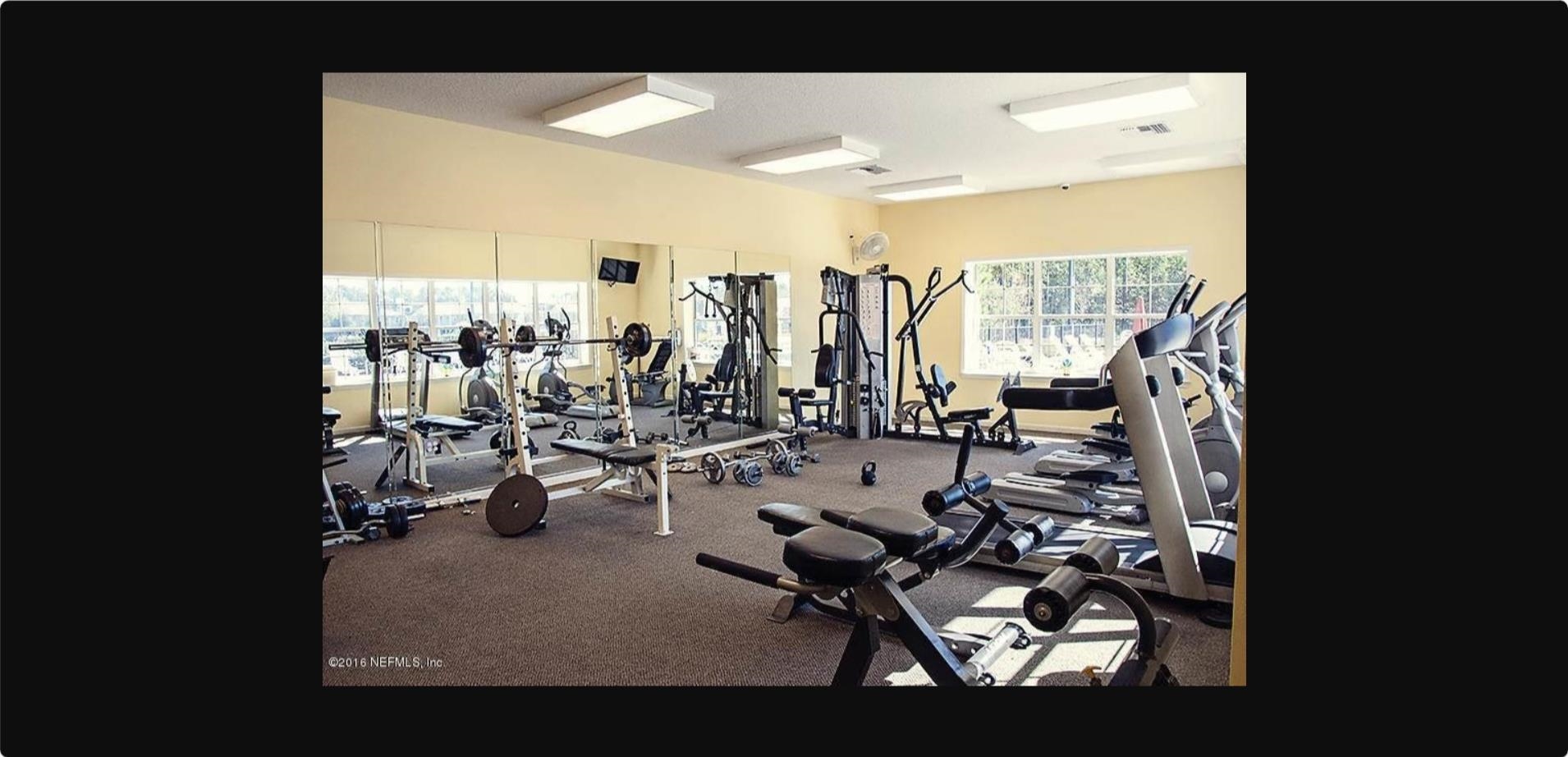 1513 Golden Lake Loop St. Augustine, FL 32084 - Photo 7 of 17 a view of a room with gym equipment