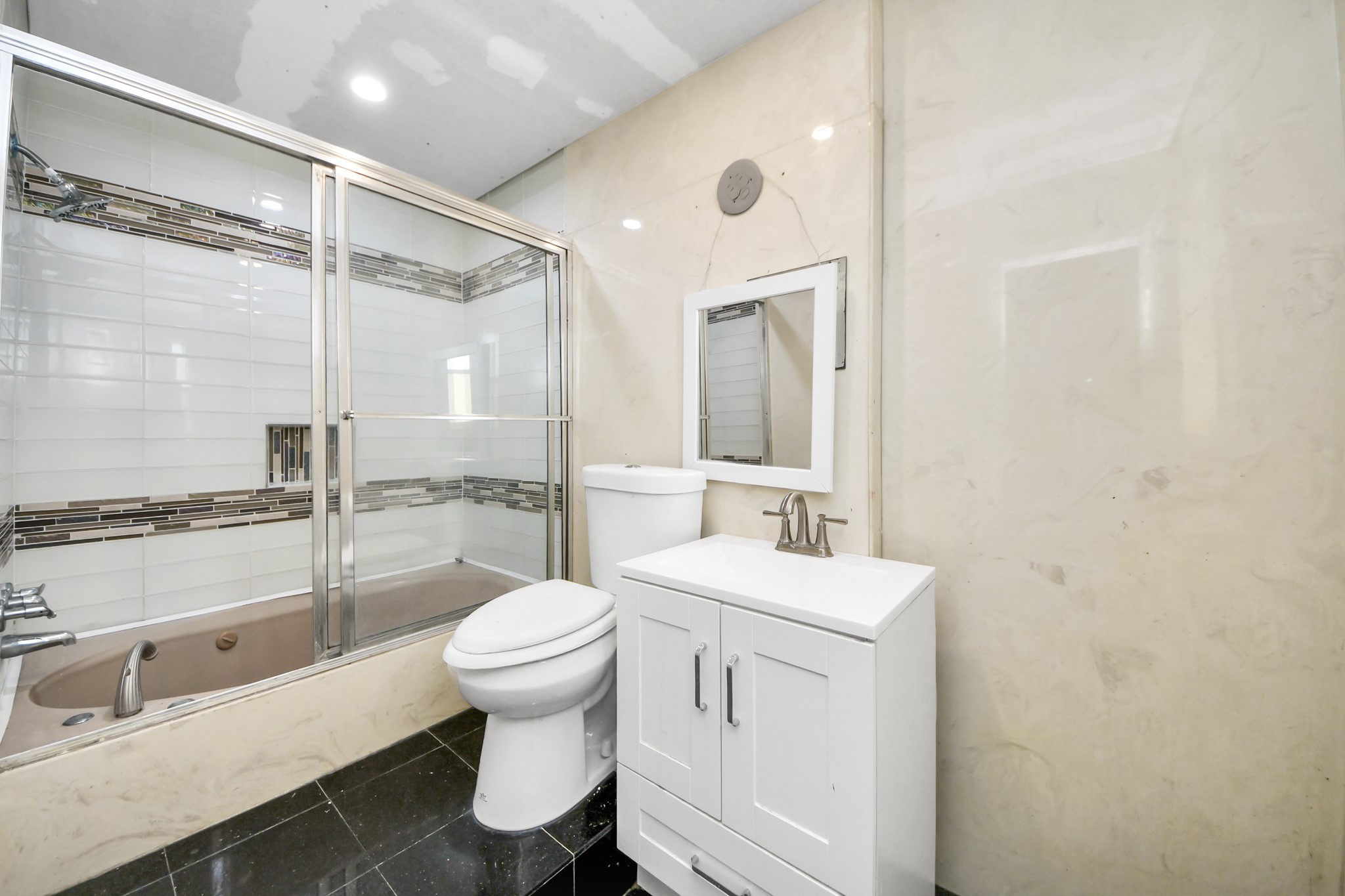 5106 Ingomar Way Houston, TX 77053 - Photo 9 of 14 a bathroom with a sink toilet and shower