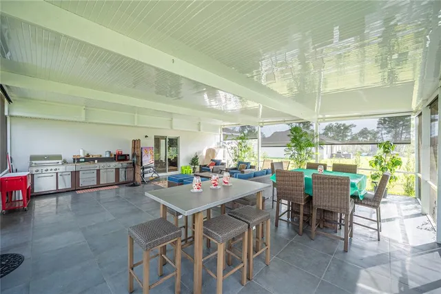 a view of a house with swimming pool garden view and a yard