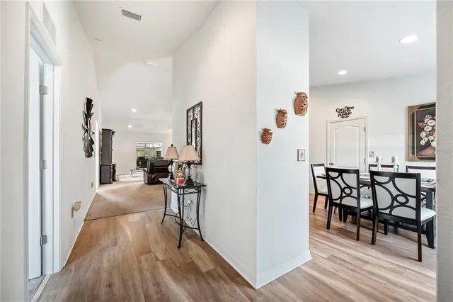 a view of entryway with wooden floor