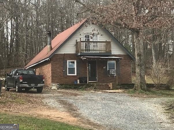 2576 John Call Road Talking Rock, GA 30175 - Photo 1 of 1 a front view of a house with a yard