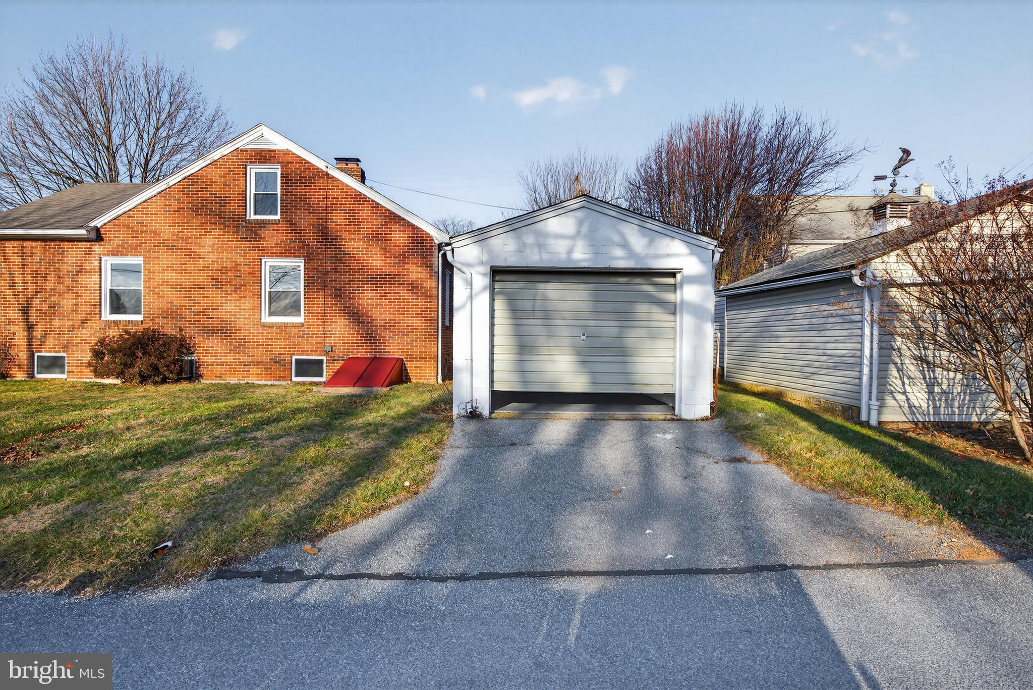 10 Dixie Drive Red Lion, PA 17356 - Photo 31 of 32 a front view of a house with a yard and garage