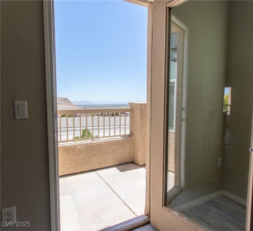 10550 West Alexander Road, Unit 2068 Las Vegas, NV 89129 - Photo 11 of 47 Balcony featuring a mountain view