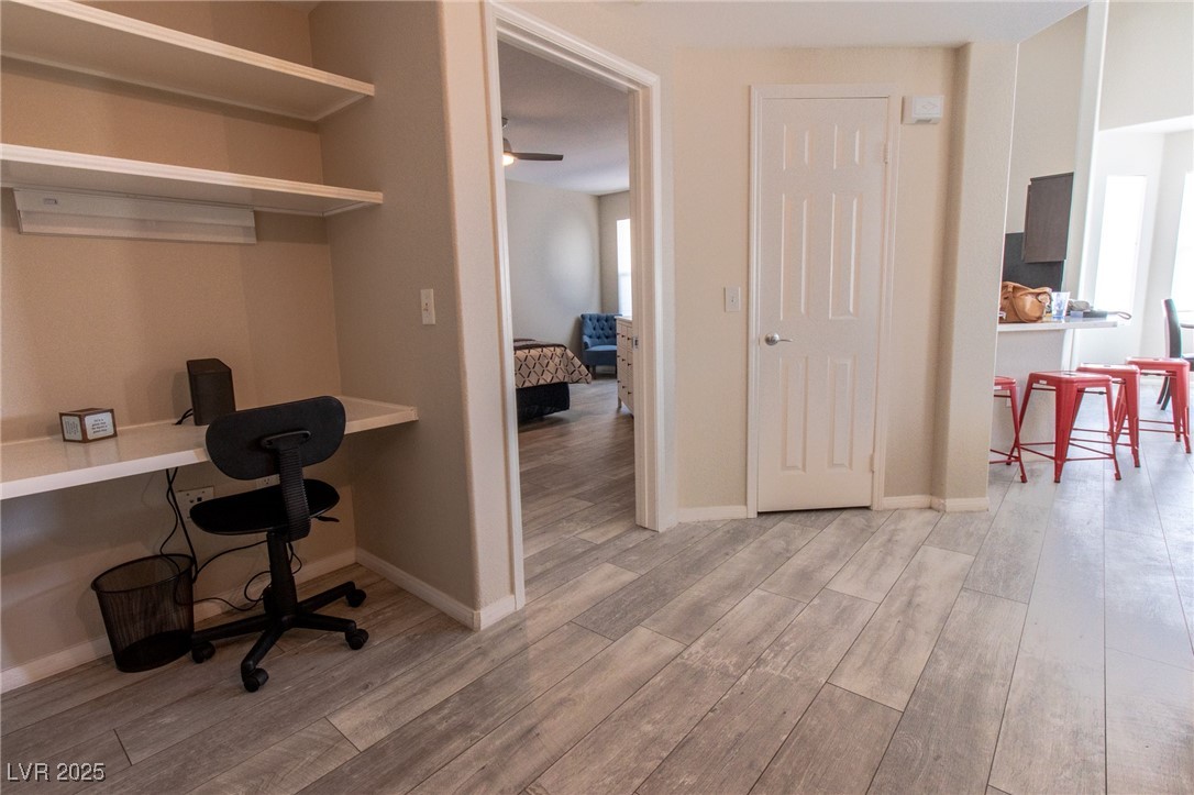 10550 West Alexander Road, Unit 2068 Las Vegas, NV 89129 - Photo 26 of 47 Office space featuring built in desk and light wood-type flooring
