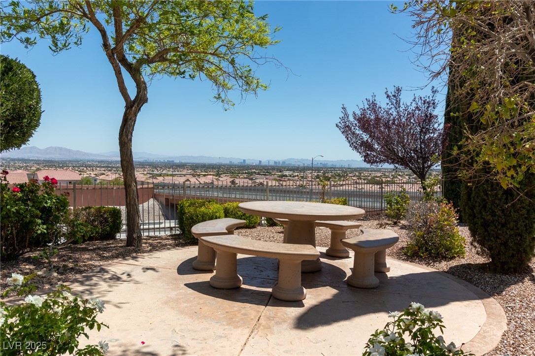 10550 West Alexander Road, Unit 2068 Las Vegas, NV 89129 - Photo 29 of 47 View of patio / terrace featuring a mountain view