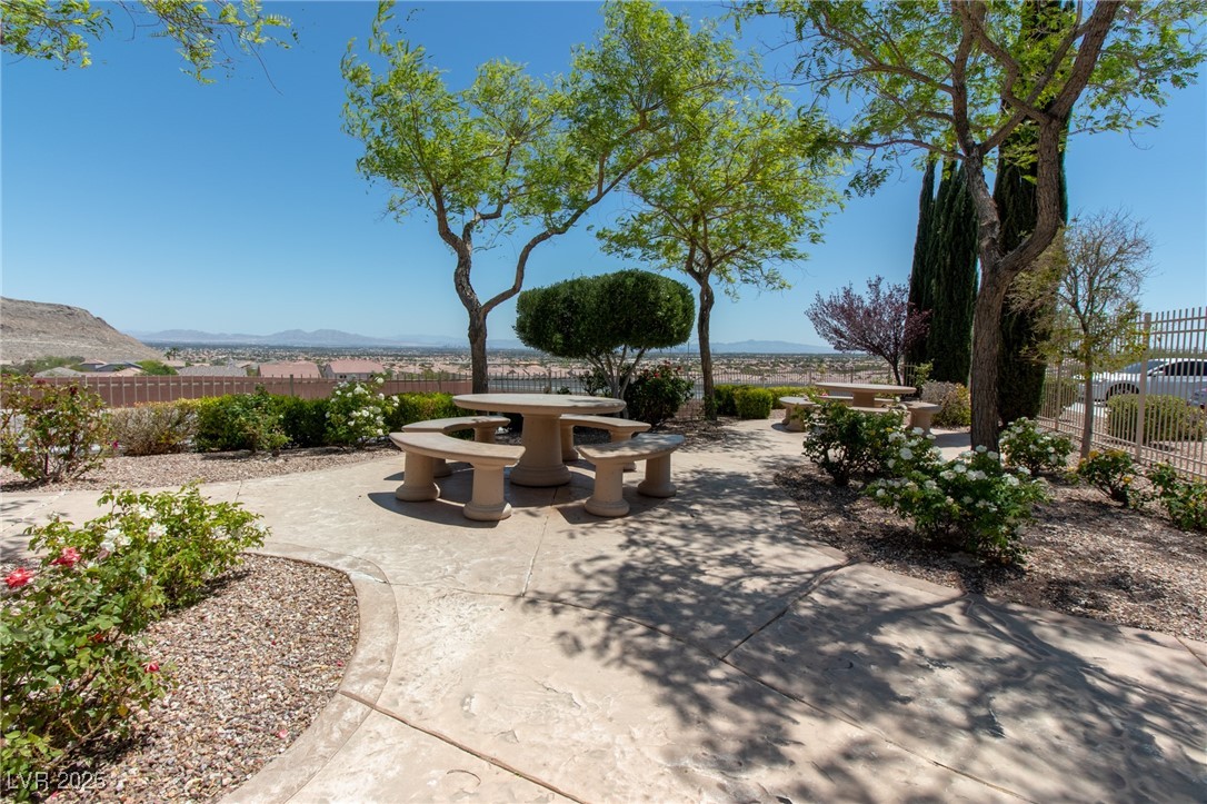 10550 West Alexander Road, Unit 2068 Las Vegas, NV 89129 - Photo 30 of 47 View of patio / terrace featuring a mountain view and outdoor dining area