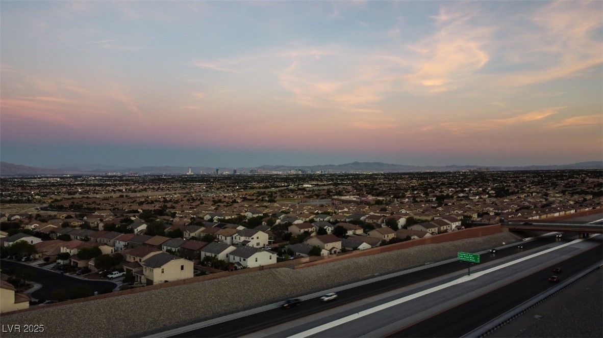 10550 West Alexander Road, Unit 2068 Las Vegas, NV 89129 - Photo 39 of 47 View of city featuring nearby suburban area and a mountain backdrop