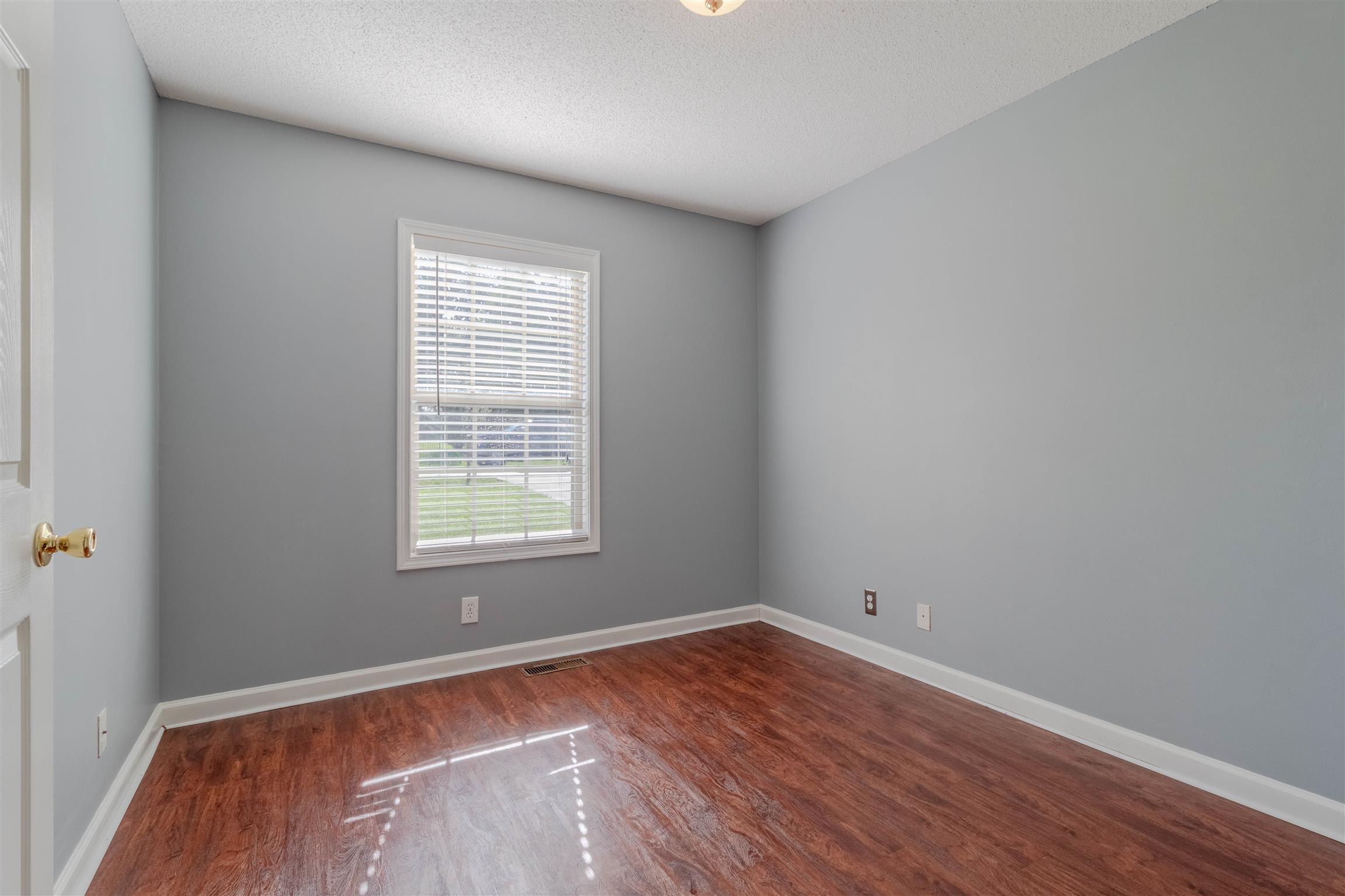 1923 Needmore Road Clarksville, TN 37042 - Photo 17 of 28 Spare bedroom 1 with laminate flooring