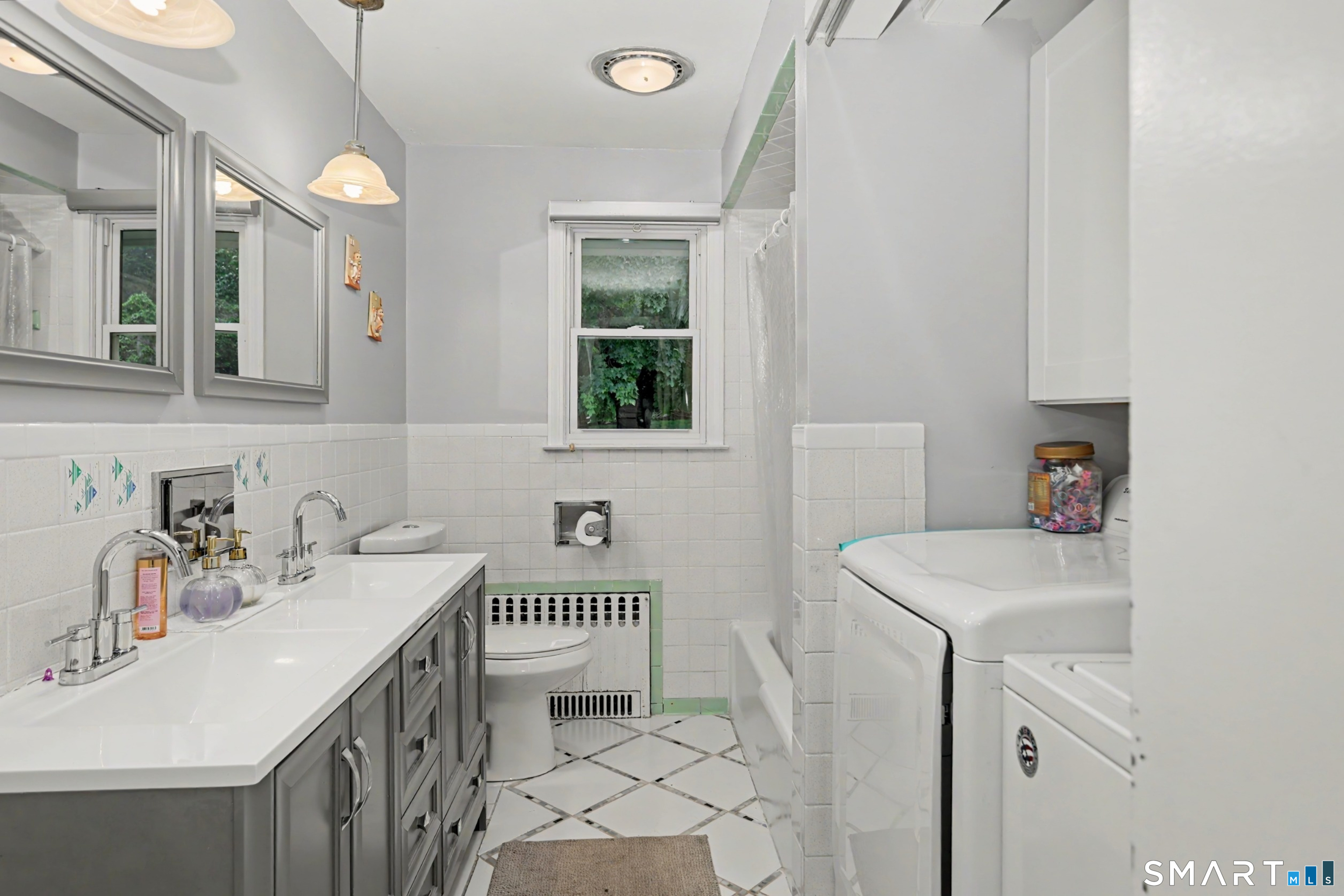 44 Haverhill Road Trumbull, CT 06611 - Photo 20 of 32 a bathroom with a sink a vanity and a toilet