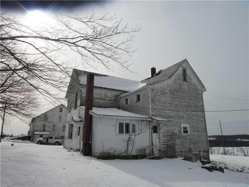 203 Slater Road Ligonier, PA 15658 - Photo 5 of 10 Exterior Back. Back of house, barn across the road.
