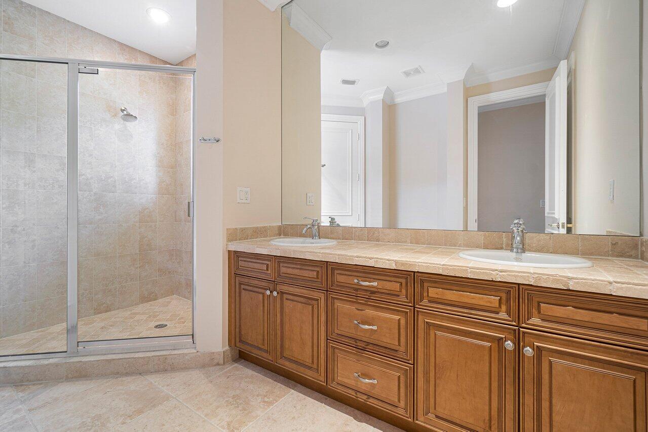 9636 Bridgebrook Drive Boca Raton, FL 33496 - Photo 32 of 50 a bathroom with a granite countertop sink mirror and double