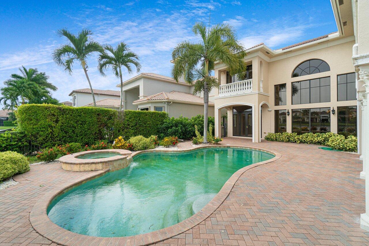 9636 Bridgebrook Drive Boca Raton, FL 33496 - Photo 39 of 50 a view of a house with swimming pool and porch