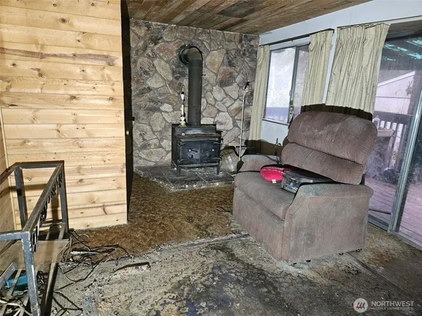 a living room with furniture and a gate