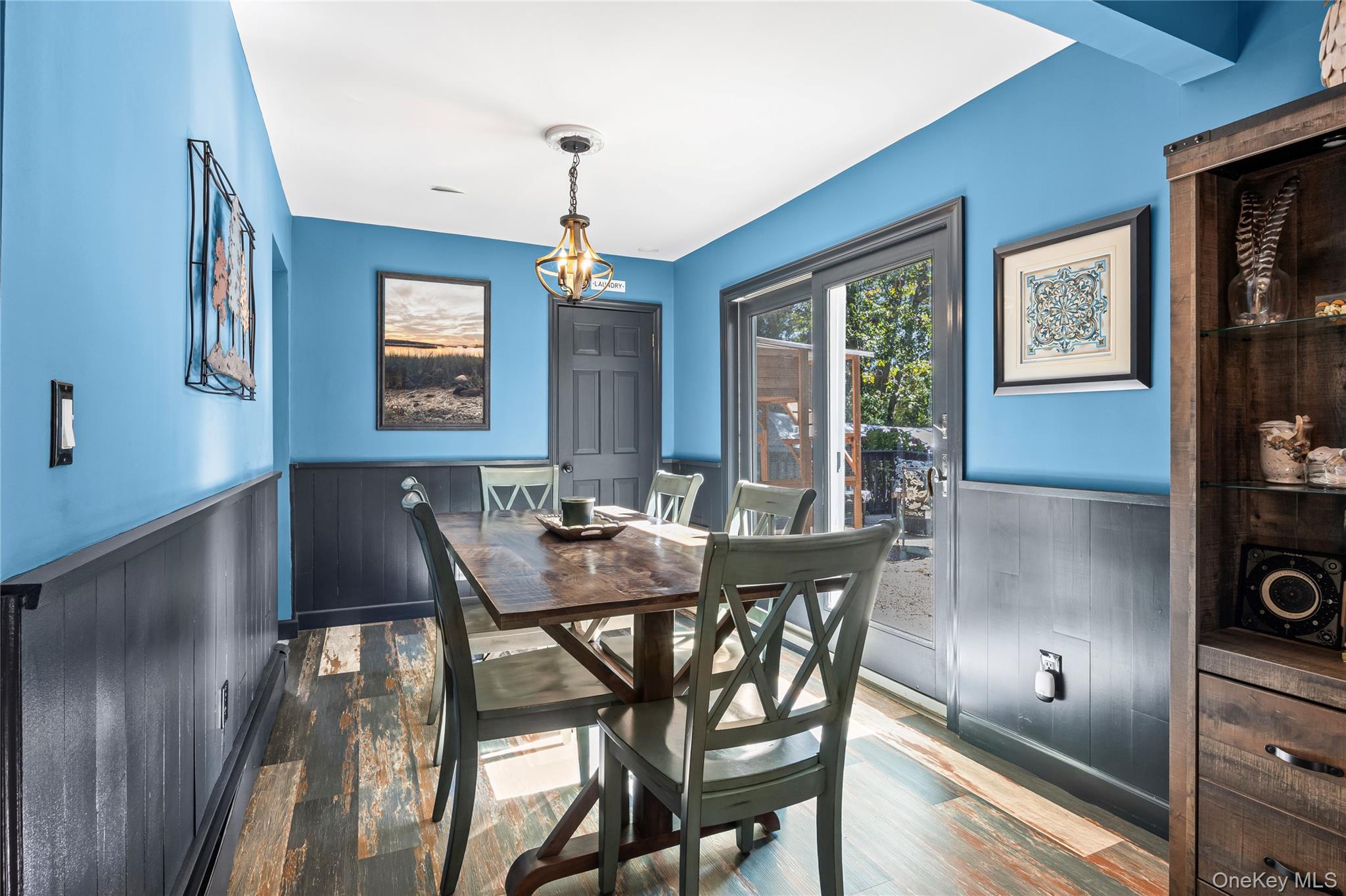4 Model Court Rocky Point, NY 11778 - Photo 15 of 36 a view of a dining room with furniture and window