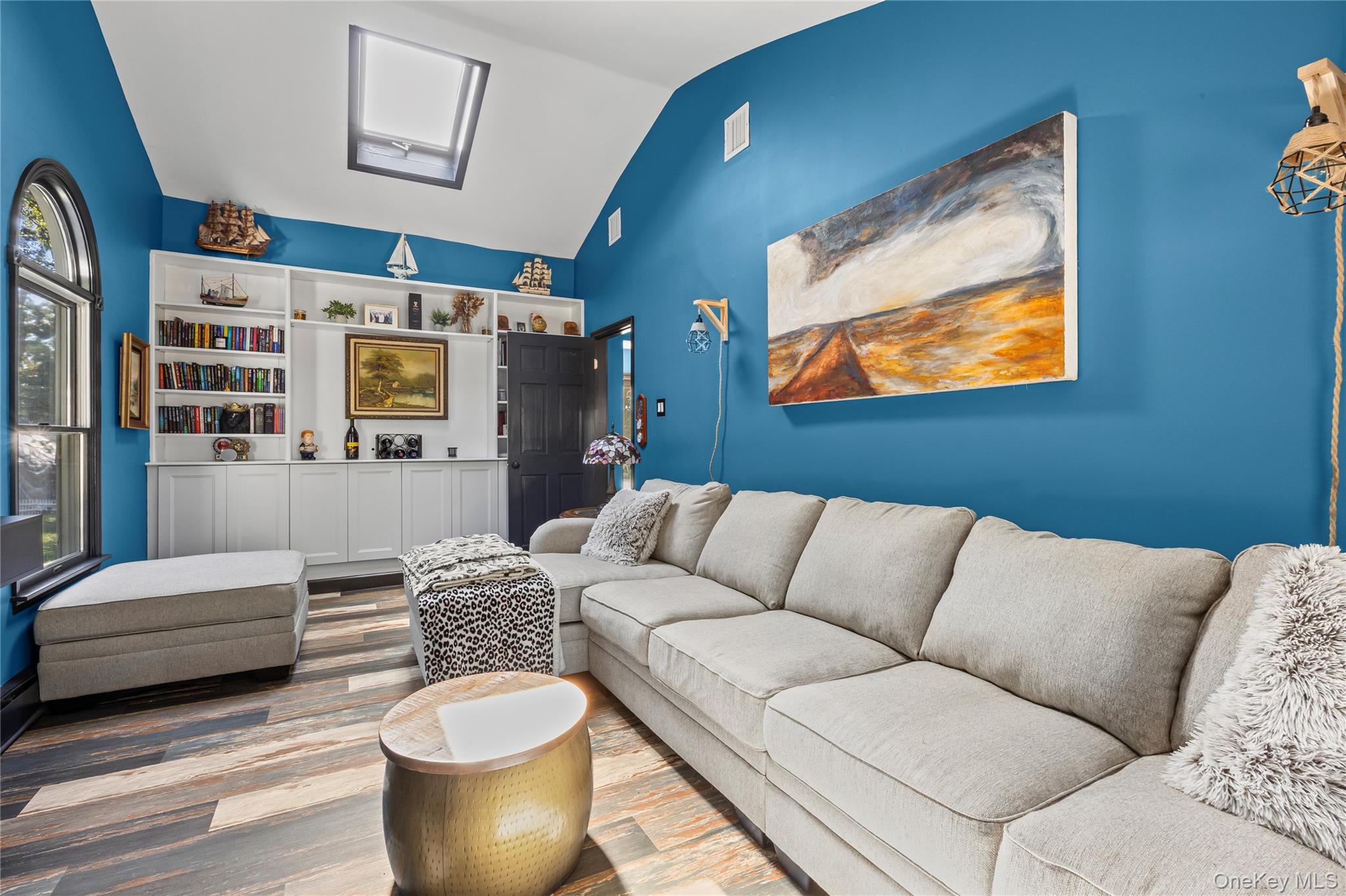 4 Model Court Rocky Point, NY 11778 - Photo 18 of 36 a living room with furniture and window