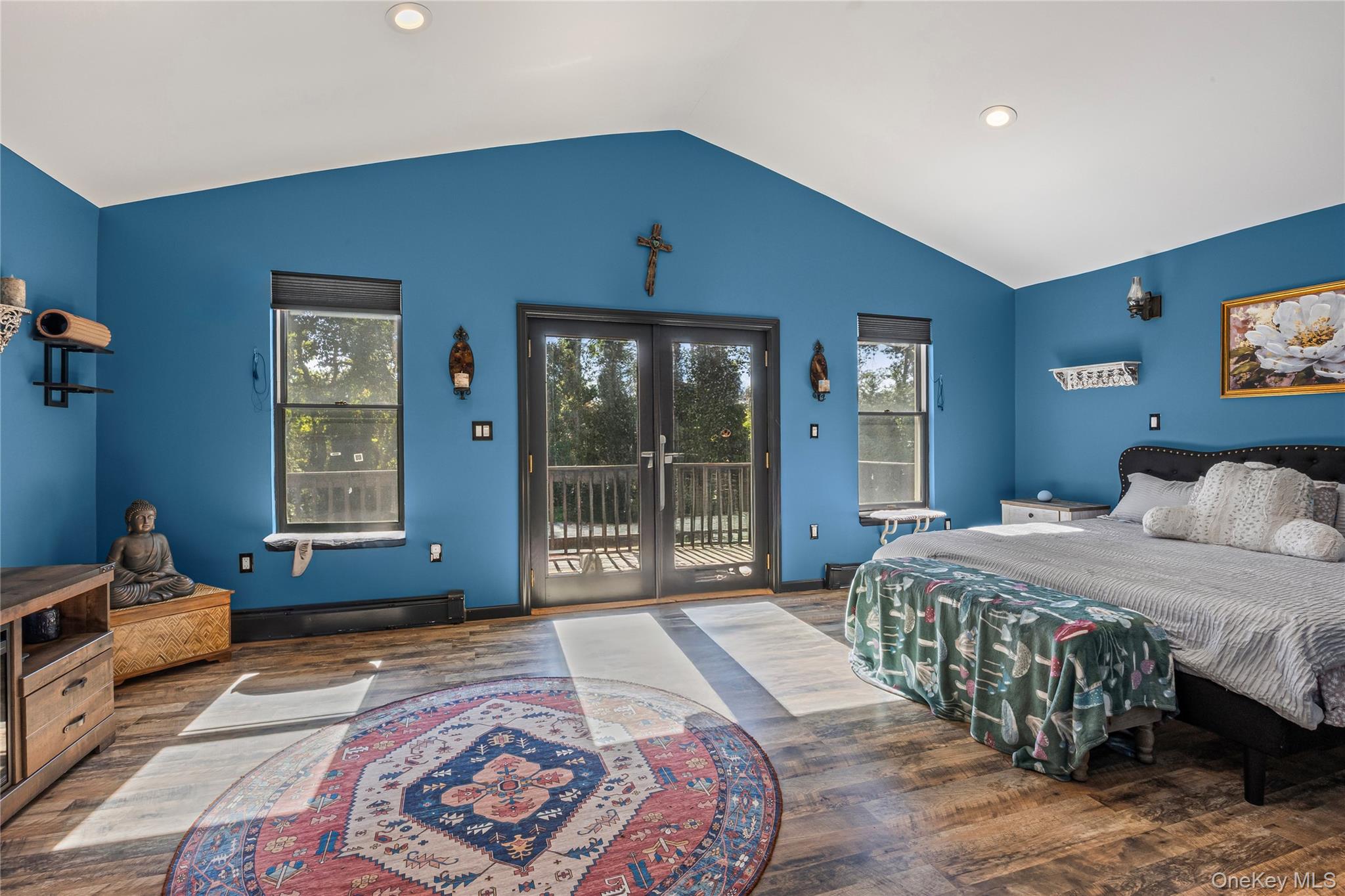 4 Model Court Rocky Point, NY 11778 - Photo 20 of 36 a bedroom with a large bed and a large window