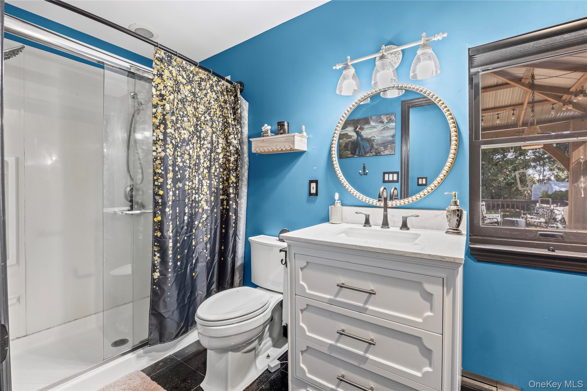 4 Model Court Rocky Point, NY 11778 - Photo 22 of 36 a bathroom with a sink a toilet and a mirror