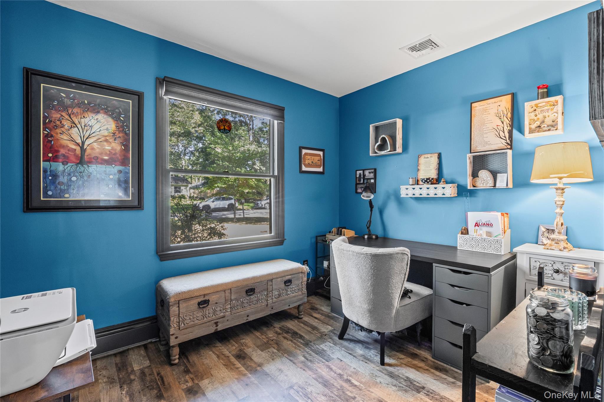 4 Model Court Rocky Point, NY 11778 - Photo 26 of 36 a view of a workspace with furniture and a window