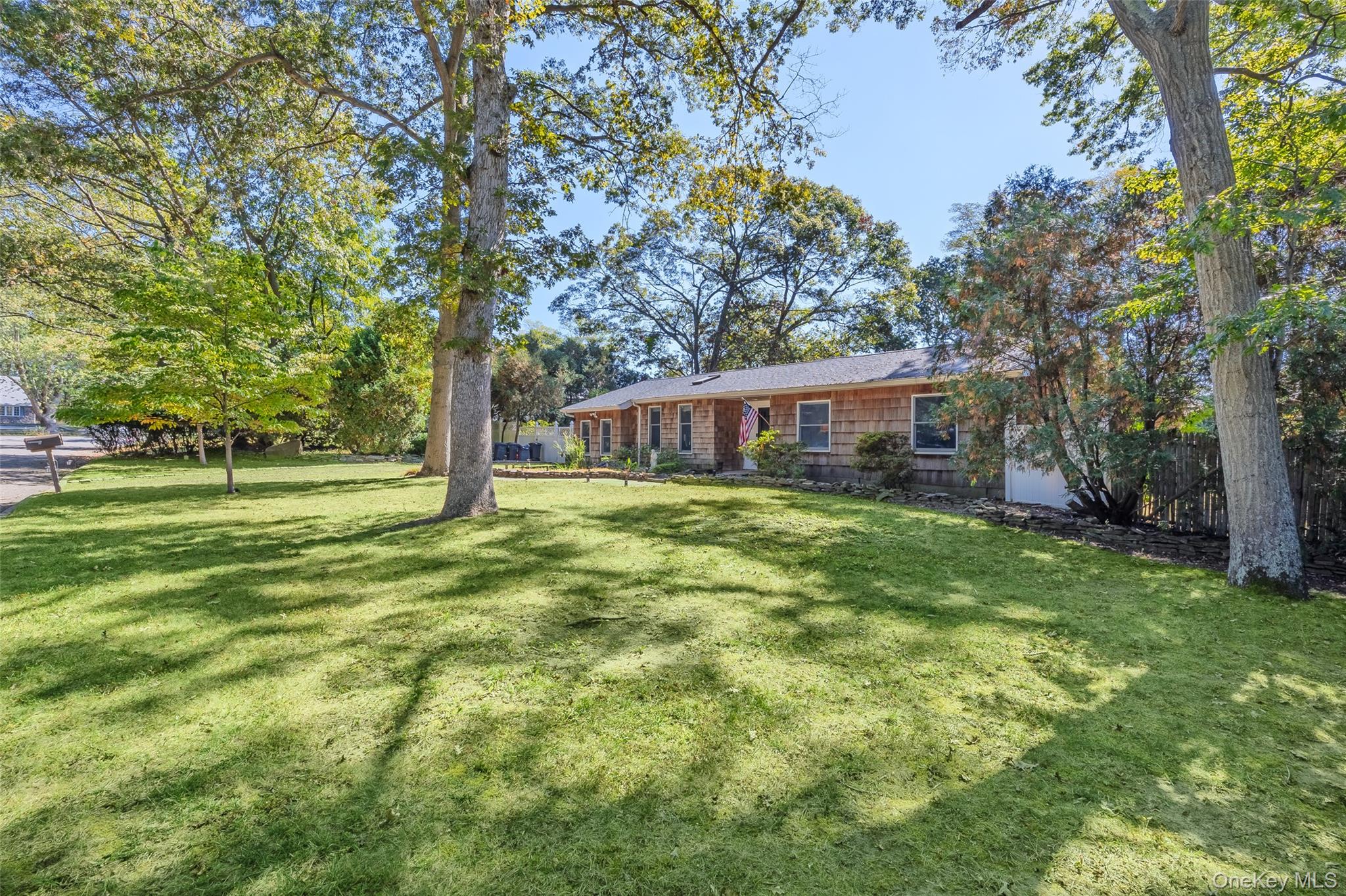 4 Model Court Rocky Point, NY 11778 - Photo 3 of 36 a view of house with outdoor space and garden