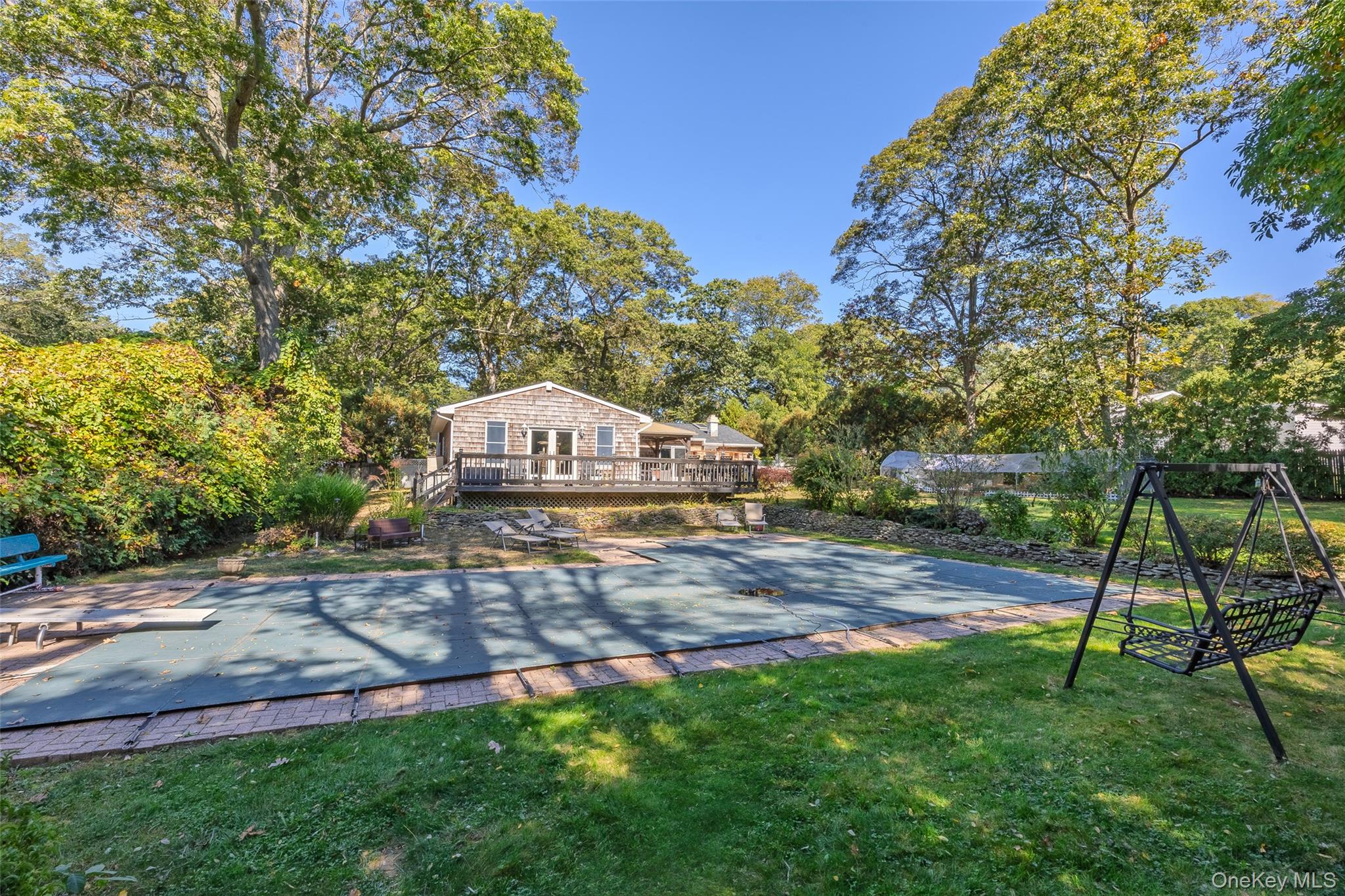 4 Model Court Rocky Point, NY 11778 - Photo 5 of 36 a view of a house with a yard