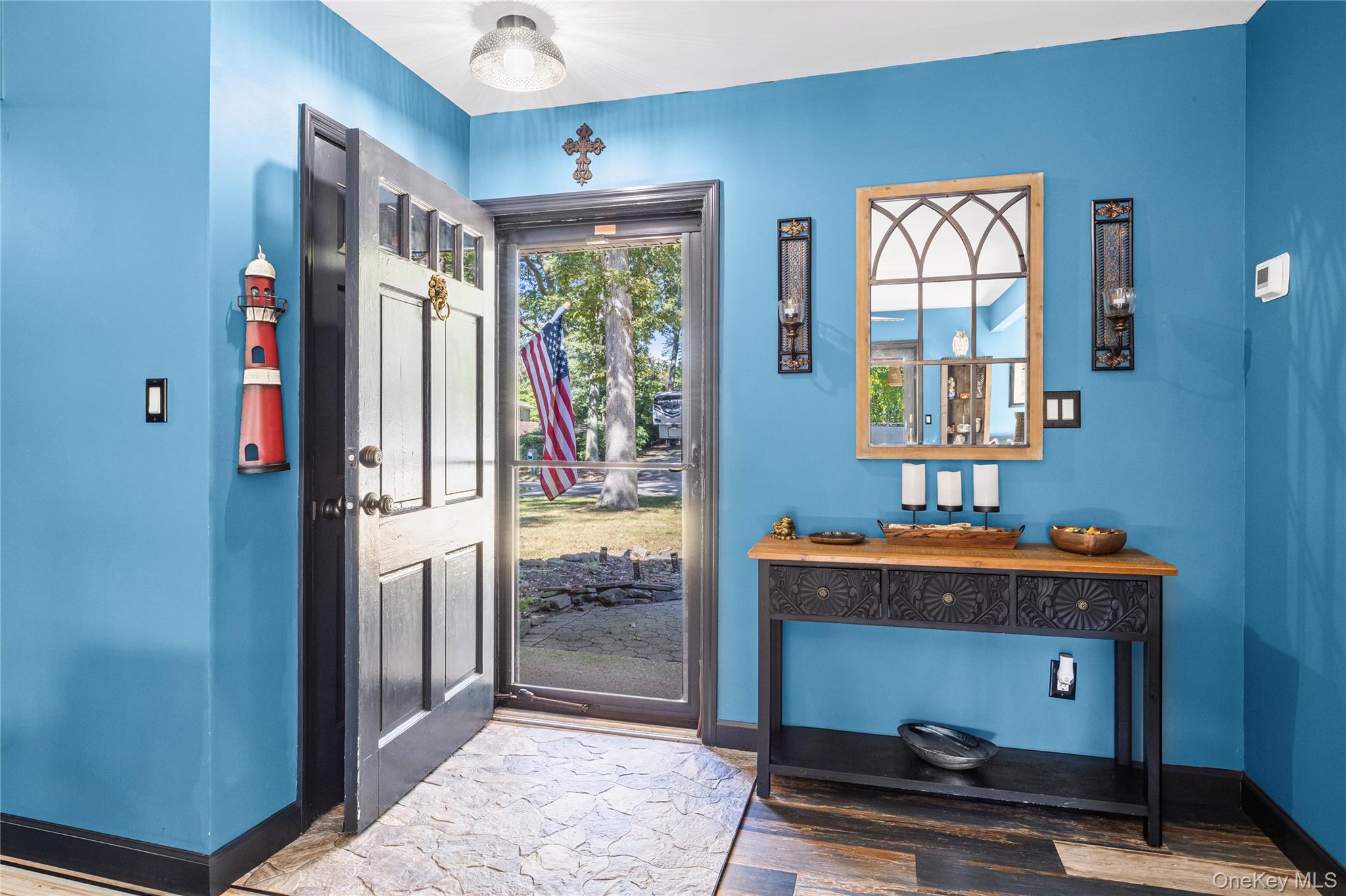 4 Model Court Rocky Point, NY 11778 - Photo 8 of 36 a room with furniture and a window