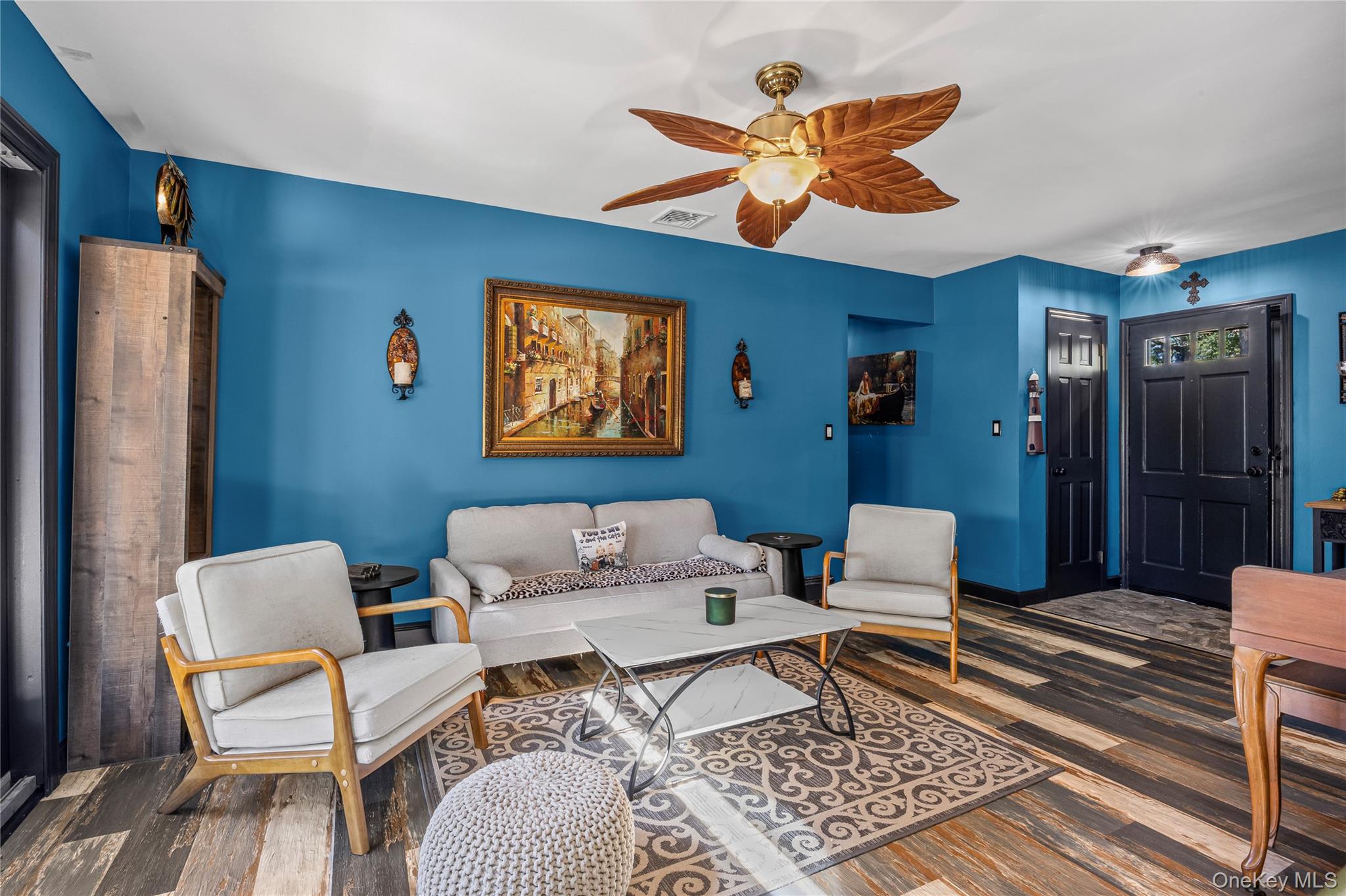 4 Model Court Rocky Point, NY 11778 - Photo 9 of 36 a living room with furniture and a rug