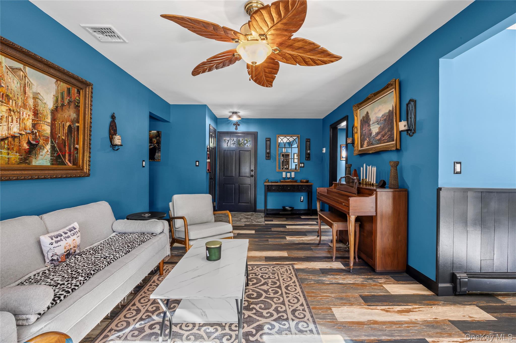 4 Model Court Rocky Point, NY 11778 - Photo 10 of 36 a living room with furniture and a flat screen tv