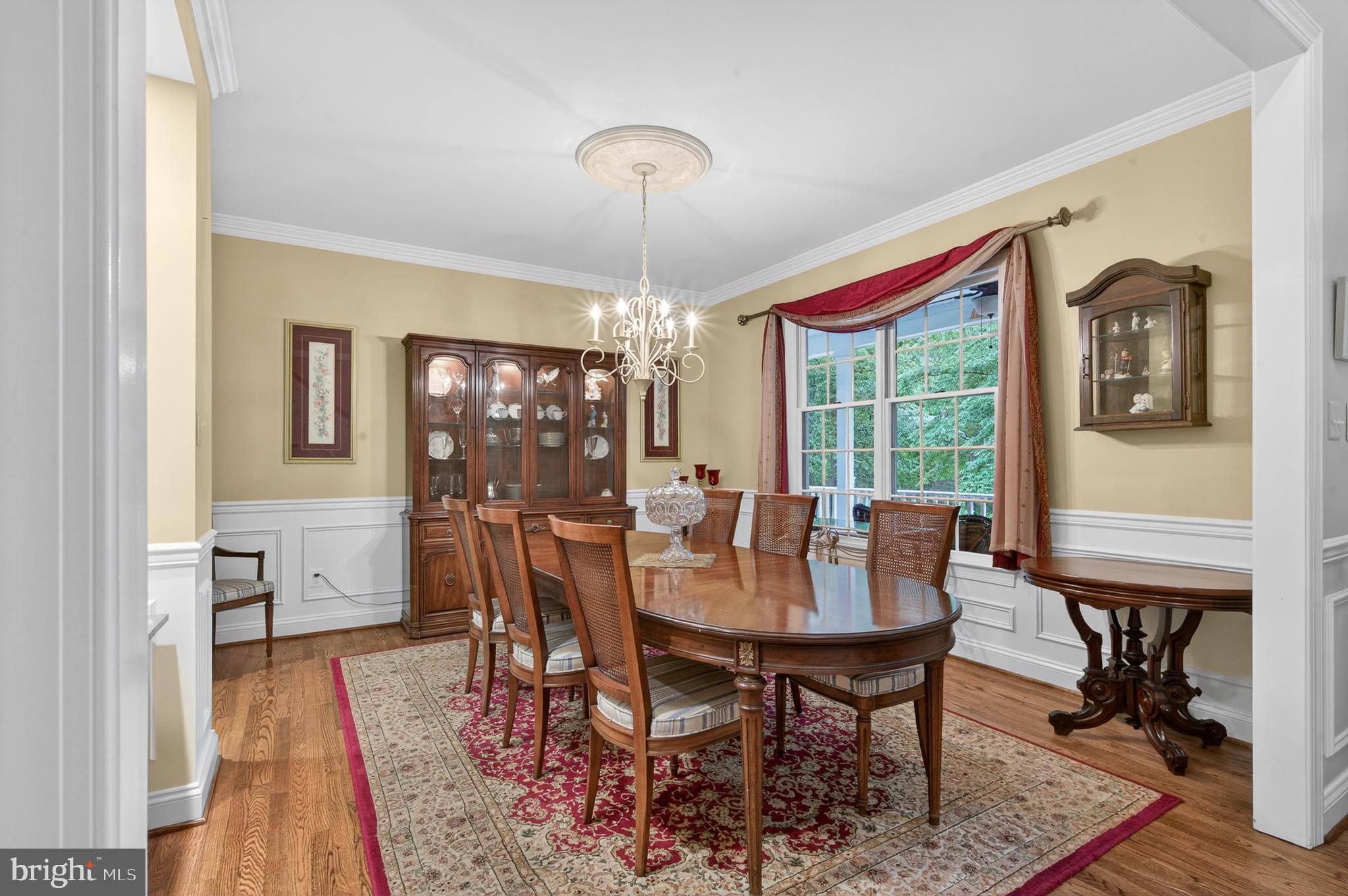 6601 Colchester Road Fairfax Station, VA 22039 - Photo 24 of 78 a view of a dining room with furniture window and wooden floor