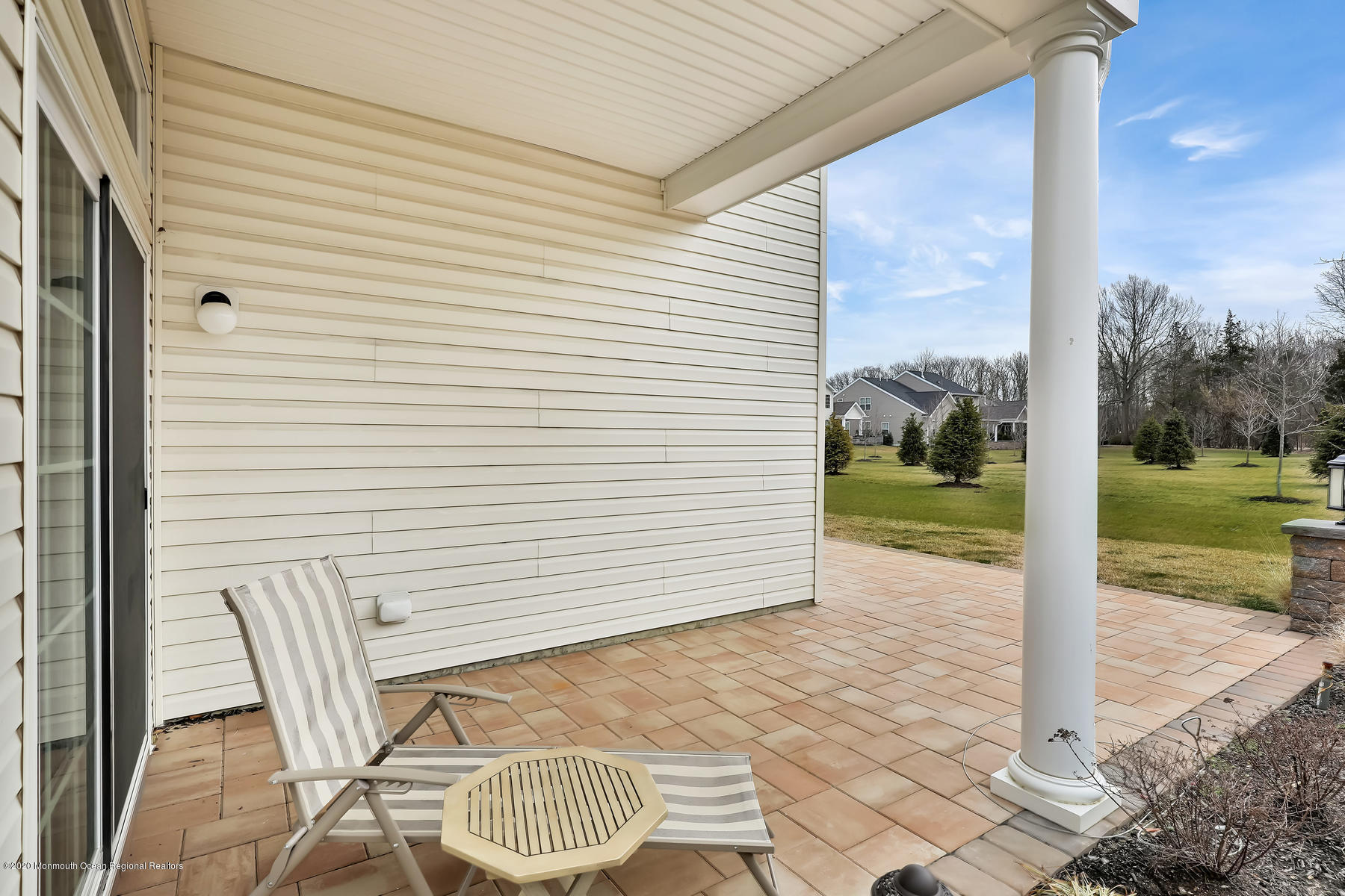 18 Sunset Drive Tinton Falls, NJ 07724 - Photo 27 of 40 Paver patio with Covered Porch
