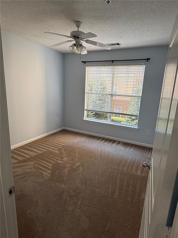 10 Perimeter Summit Boulevard, Unit 3201 Brookhaven, GA 30319 - Photo 12 of 27 a view of an empty room with a window