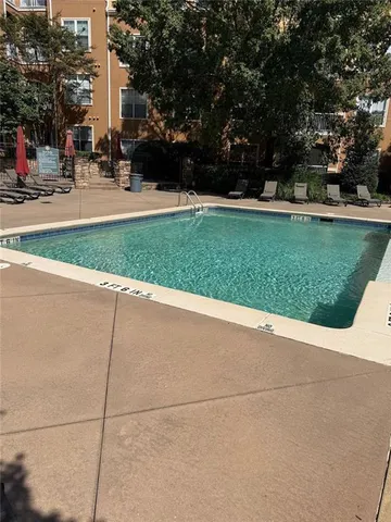 a view of a park with many windows