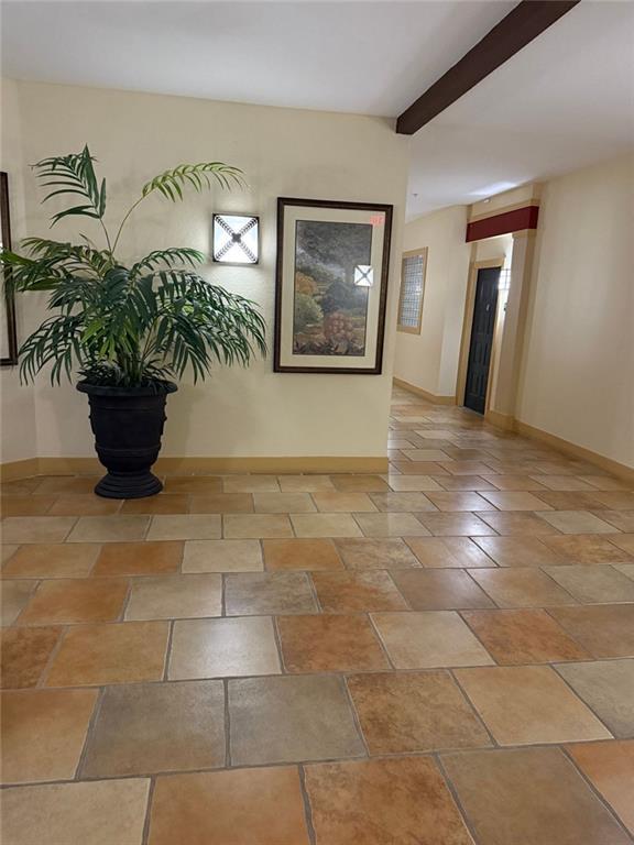 10 Perimeter Summit Boulevard, Unit 3201 Brookhaven, GA 30319 - Photo 2 of 27 a view of entryway with an potted plant