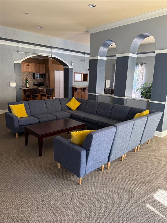 10 Perimeter Summit Boulevard, Unit 3201 Brookhaven, GA 30319 - Photo 21 of 27 a living room with furniture and wooden floor