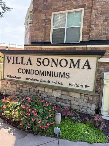 a sign in front of building