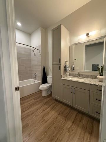 930 Ridgeview Drive, Unit 1273 Allen, TX 75013 - Photo 19 of 28 a bathroom with a tub sink toilet and mirror