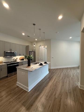 930 Ridgeview Drive, Unit 1273 Allen, TX 75013 - Photo 22 of 28 a view of kitchen with sink and wooden floor