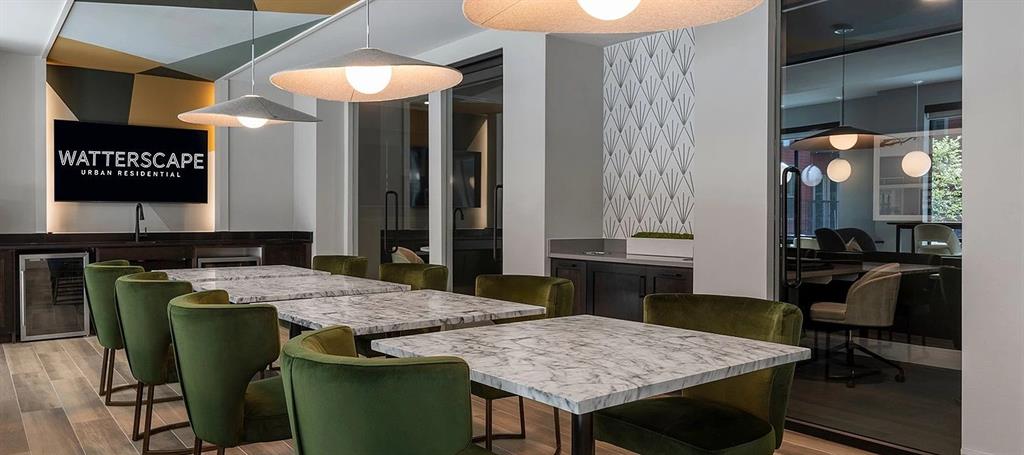 930 Ridgeview Drive, Unit 1273 Allen, TX 75013 - Photo 5 of 28 a kitchen with a table and chairs in it