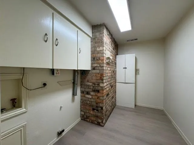 a view of storage and utility room