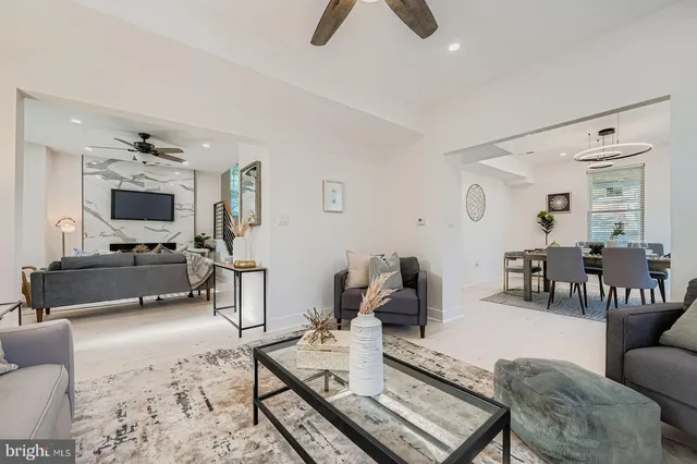 a living room with furniture or couch and a window