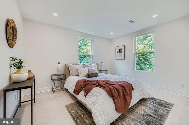 a bedroom with a bed and furniture