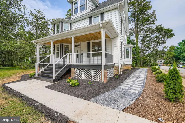 a view of balcony with wooden floor