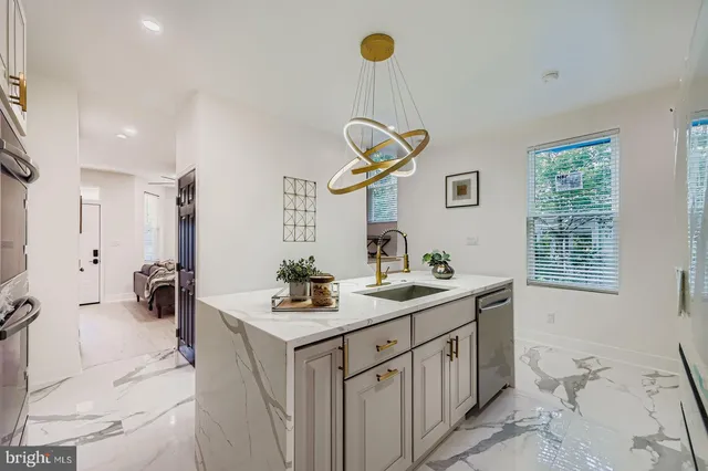 a kitchen with stove cabinets and a fireplace