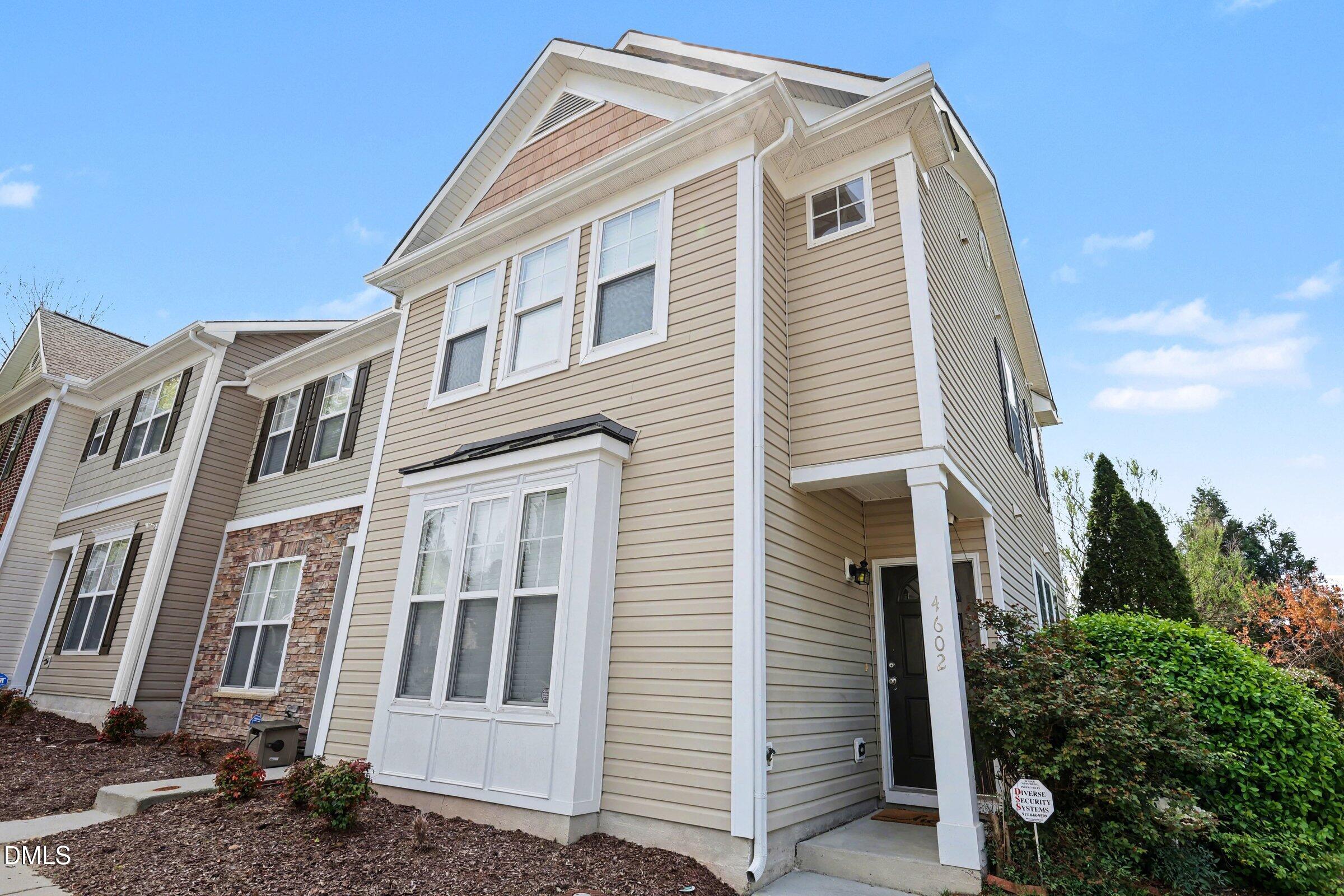 4602 Peyton Hall Way Raleigh, NC 27604 - Photo 1 of 17 a view of a house with a yard