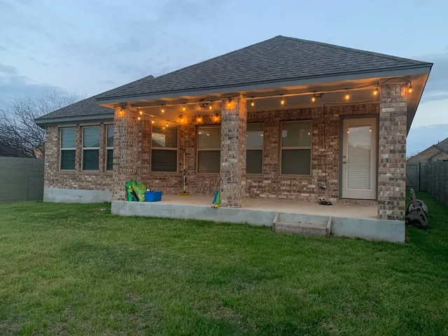 a view of a house with a garden
