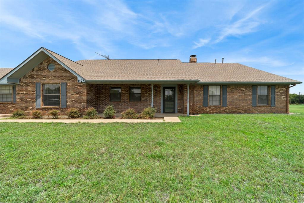 1175 Bloom Street Lucas, TX 75002 - Photo 2 of 36 a front view of a house with a yard