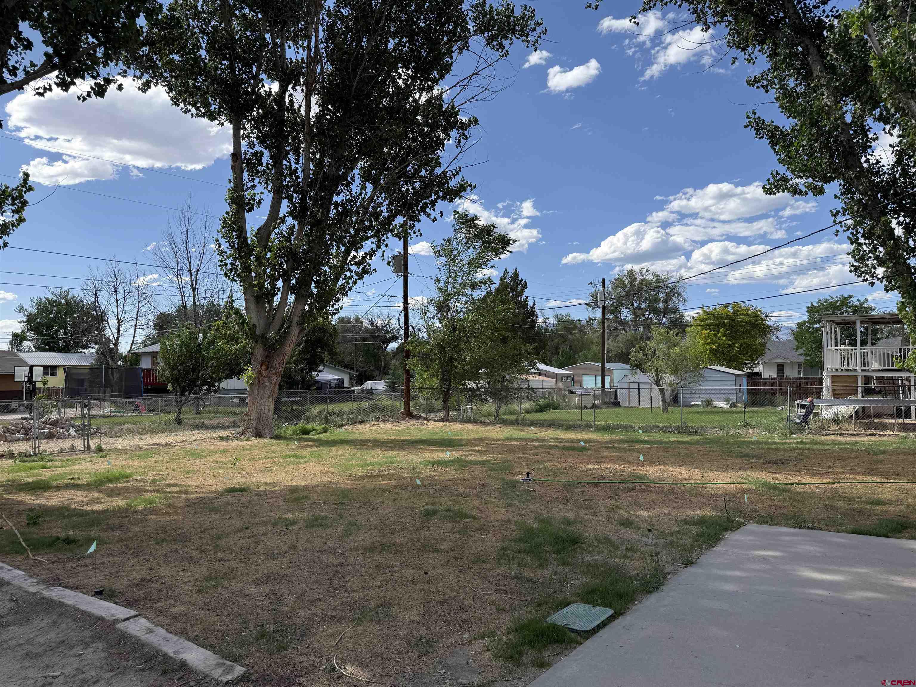 525 Sloan Street Delta, CO 81416 - Photo 26 of 26 a view of grassy field with trees
