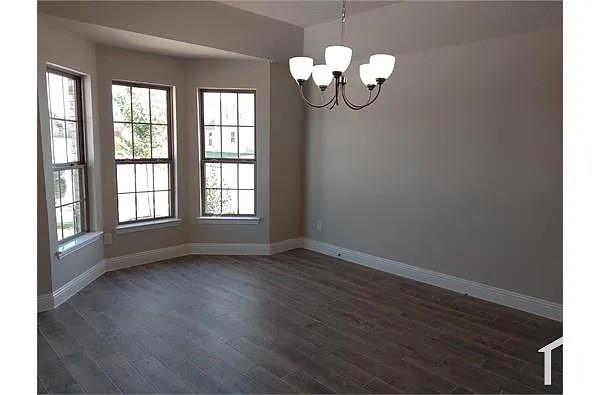 4254 Calla Drive Forney, TX 75126 - Photo 4 of 7 wooden floor in an empty room with a window
