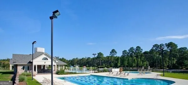a view of house with outdoor space and street view