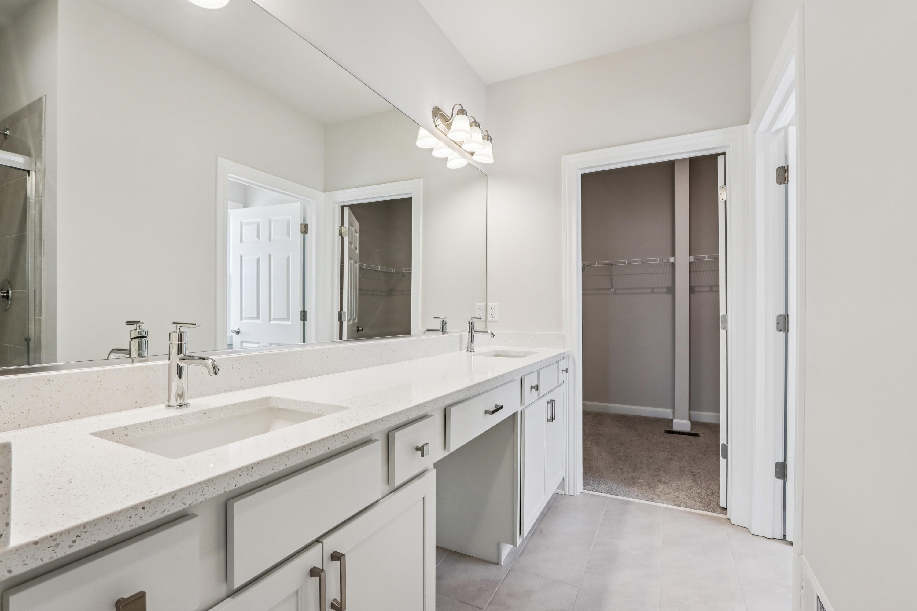 527 North Boulder Ridge Drive Lake Geneva, WI 53147 - Photo 35 of 41 Double Vanity w/make up area, walk in closet entry